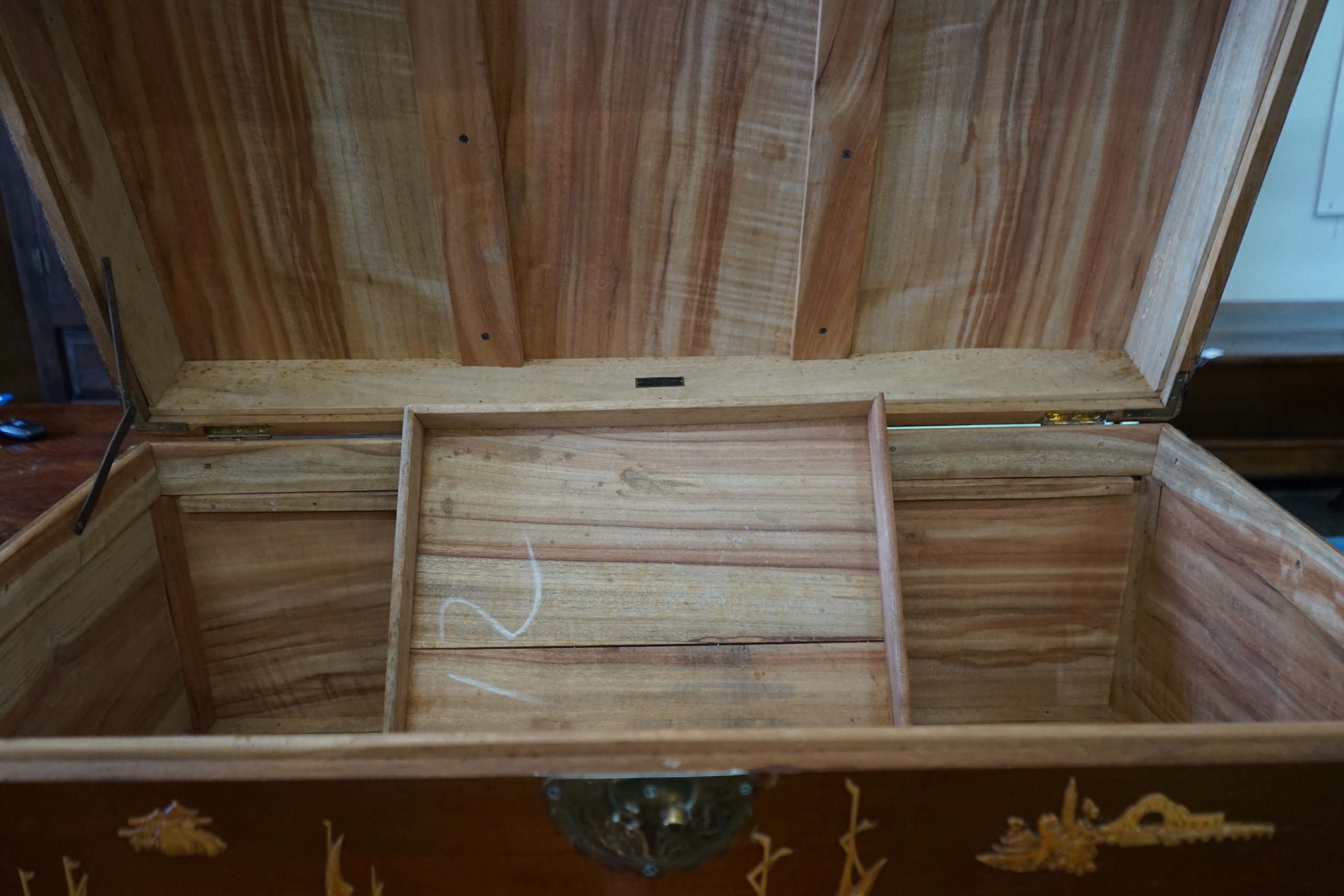 A Chinese camphorwood trunk, length 104cm, depth 53cm, height 58cm